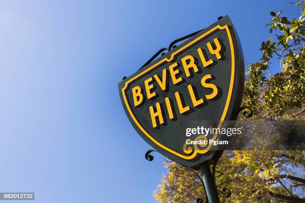 beverly hills shield street sign in california usa - beverly hills shopping stock pictures, royalty-free photos & images