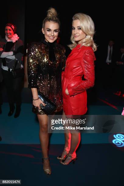 Pixie Lott and Tallia Storm attend the UK launch event for the new Ferrari Portofino at Kensington Olympia on November 29, 2017 in London, England.