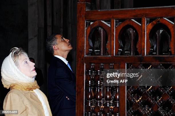 President Barack Obama and US Secretary of State Hillary Clinton tour the Sultan Hassan Mosque in Cairo, on June 4, 2009. The pair took a tour of the...