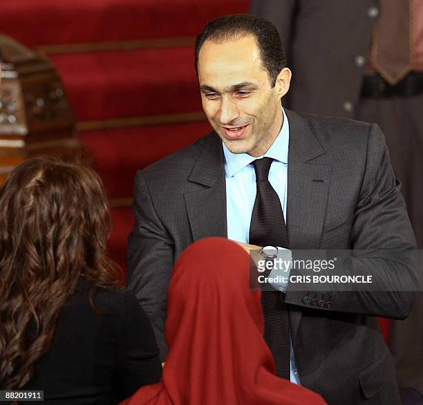 Gamal Mubarak, head of the political comittee of the Egyptian ruling National Democratic Party and son of president Hosni Mubarak talks to womens...