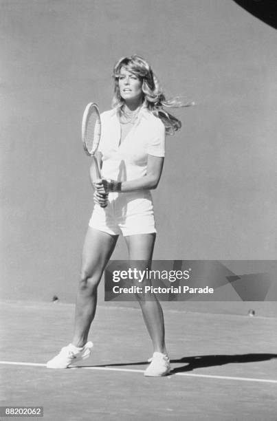 American actress Farrah Fawcett plays tennis in an episode of the television program 'Charlie's Angels,' mid 1977.