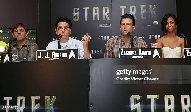 Writer Roberto Orci, director J.J. Abrams, actor Zachary Quinto and actress Zoe Saldana and attend the "Star Trek" press conference at the Four...