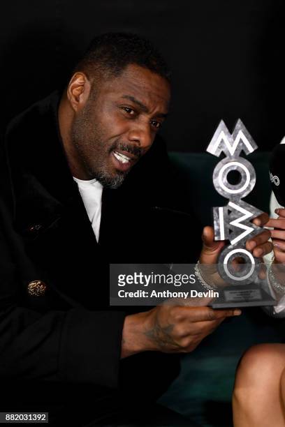 Idris Elba poses in the winners room with the Paving The Way award at the MOBO Awards at First Direct Arena Leeds on November 29, 2017 in Leeds,...