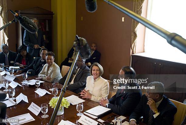 June 03: House Speaker Nancy Pelosi, D-Calif., during a photo op in her office with members of the Black Leadership Forum. Congressional Black Caucus...