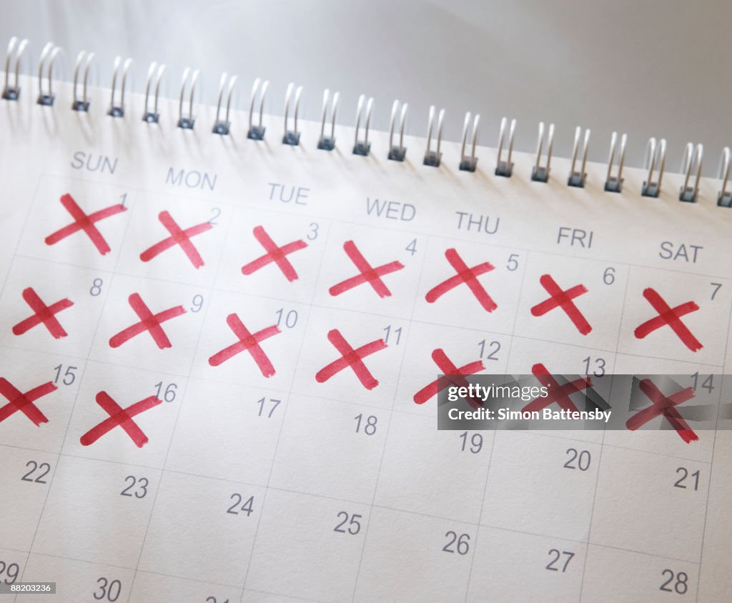 Calendar with dates crossed out