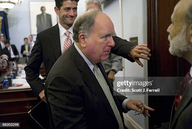 June 03: Federal Reserve Chairman Benjamin S. Bernanke, right, with Chairman John M. Spratt Jr., D-S.C., and ranking member Paul D. Ryan, R-Wis. ,...