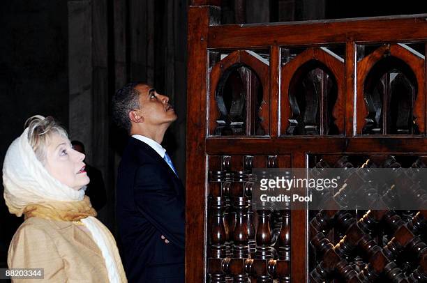 President Barack Obama and his Secretary of State Hillary Clinton visit the Sultan Hassan mosque before making his key Middle East policy speech on...