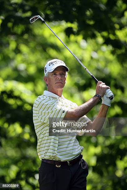 Larry Mize watches his shot during the third round of the 70th Senior PGA Championship at Canterbury Golf Club on May 23, 2009 in Beachwood, Ohio.