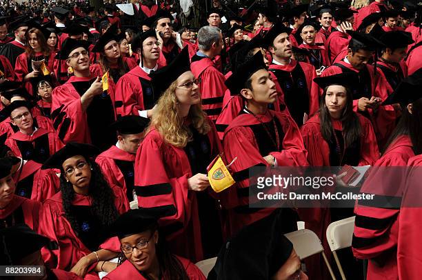 Harvard University students attend commencement ceremonies June 4, 2009 in Harvard Yard in Cambridge, Massachusetts. Founded in 1636, this year marks...