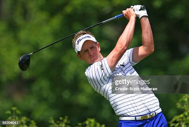 Luke Donald of England hits his tee shot on the 18th hole during the first round of the Memorial Tournament at the Muirfield Village Golf Club on...