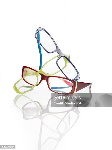 stacked reading glasses - occhiali da lettura foto e immagini stock