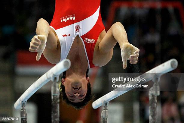 German gymnast Philipp Boy performs on the parallel bars at the German individual championship during the German Gymnastics Festival at the...