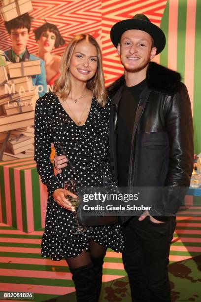 Darya Strelnikova and her boyfriend Roger Steininger during the Jo Malone London 'Crazy Colourful Christmas' event at Goldberg Studios on November...