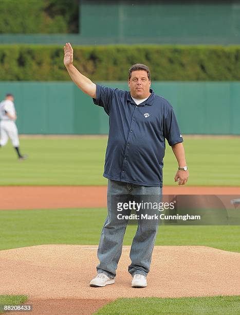 Actor Steve Schirripa waves to the crowd while throwing out the first pitch of the game between the Boston Red Sox and the Detroit Tigers at Comerica...