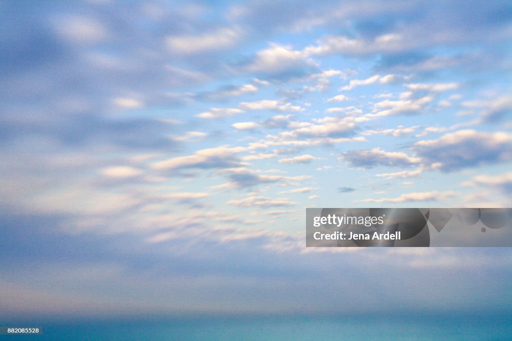 Blue Sky Clouds Over Water