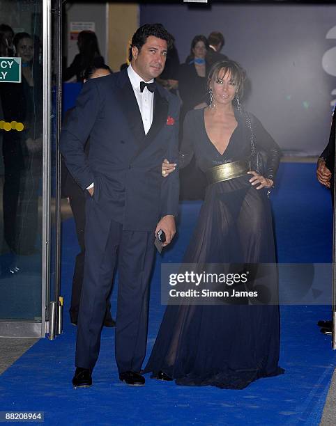 Tara Palmer-Tompkinson and guest arrive for the ARK Gala Dinner at the disused Waterloo International Terminal on June 4, 2009 in London, England.