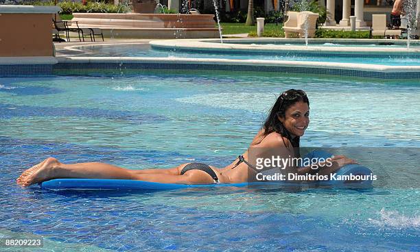 Bethenny Frankel wearing a LaRok bathing suit attends the grand opening of Italian Village & Pirates Island Waterpark at Beaches Turks & Caicos...