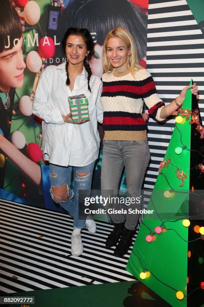 Delia Fischer, CEO Westwing and her sister Jana Fischer during the Jo Malone London 'Crazy Colourful Christmas' event at Goldberg Studios on November...