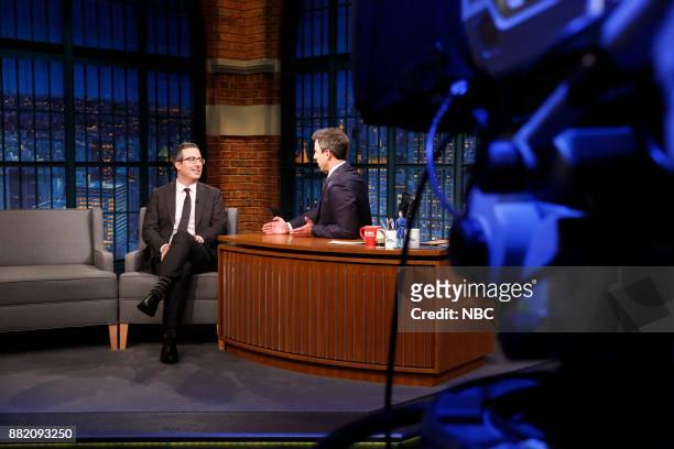 Episode 617 -- Pictured: Comedian John Oliver talks with host Seth Meyers during an interview on November 29, 2017 --