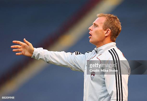 Head Coach Gary Smith of the Colorado Rapids looks on frm the bench against the New York Red Bulls at Giants Stadium in the Meadowlands on May 30,...