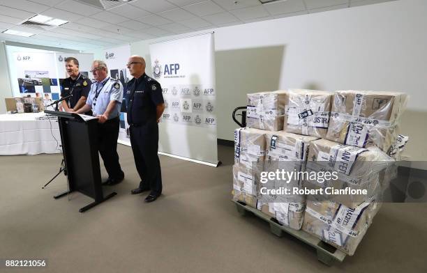 Representatives from the Victorian Joint Organised Crime Taskforce address the media at the Australian Federal Police Melbourne office on November...