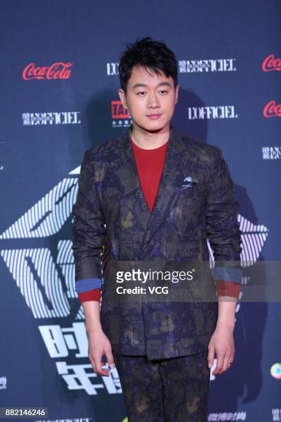 Actor Tong Dawei arrives at the red carpet of L'Officiel Fashion Night 2017 on November 29, 2017 in Beijing, China.