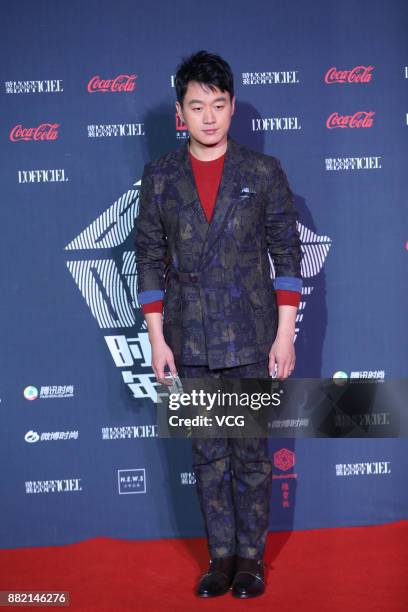 Actor Tong Dawei arrives at the red carpet of L'Officiel Fashion Night 2017 on November 29, 2017 in Beijing, China.