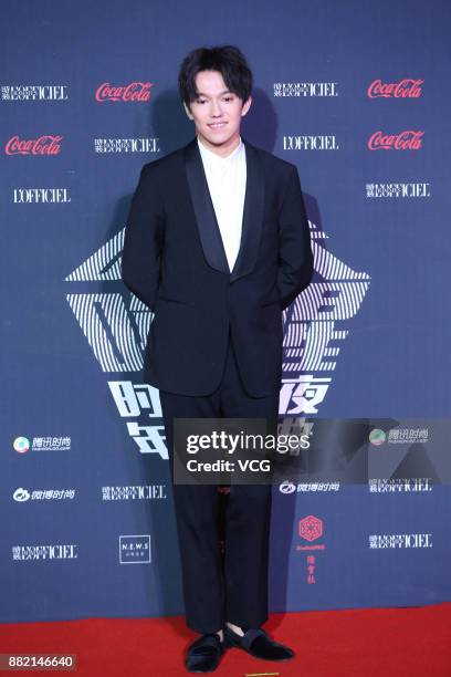 Singer Dimash Kudaibergen arrives at the red carpet of L'Officiel Fashion Night 2017 on November 29, 2017 in Beijing, China.