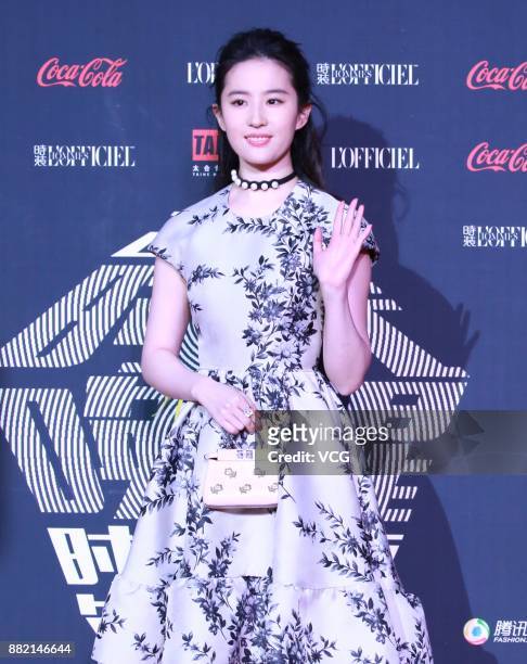 Actress Liu Yifei arrives at the red carpet of L'Officiel Fashion Night 2017 on November 29, 2017 in Beijing, China.