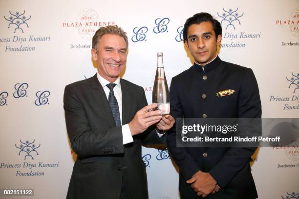 World sales at Danone Waters, Laurent Cintrat and HRH the Maharaja Sawai Padmanabh Singh of jaipur pose with the "Evian Water Bottle : Princess Diya...