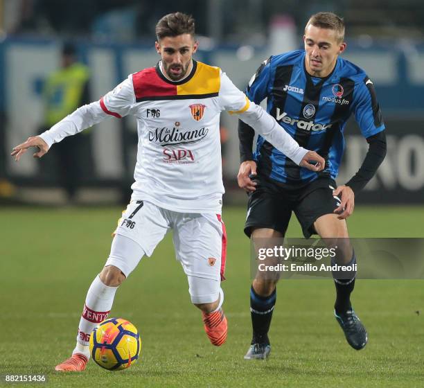 Marco D'Alessandro of Benevento Calcio is challenged by Timothy Castagne of Atalanta BC during the Serie A match between Atalanta BC and Benevento...