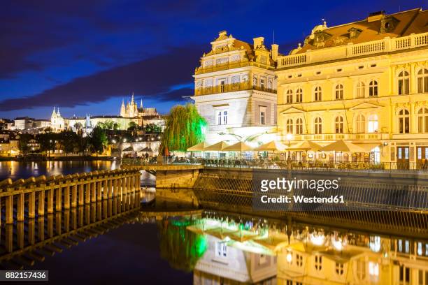 czech republic, prague, hradcany, castle, bedrich smetana museum and club restaurant lavka at night - smetana museum stock pictures, royalty-free photos & images
