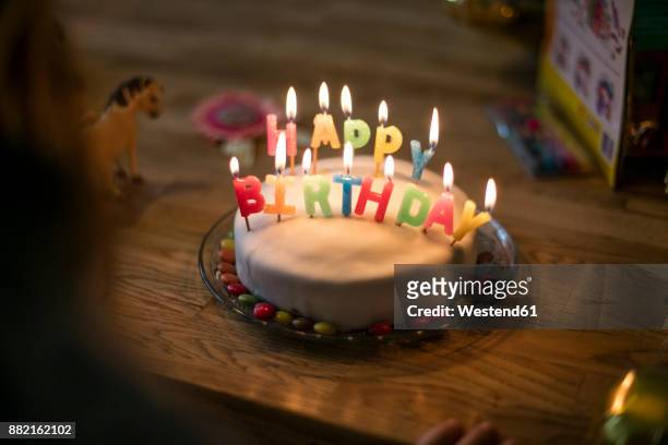 little girl's birthday cake - ambient light stock pictures, royalty-free photos & images