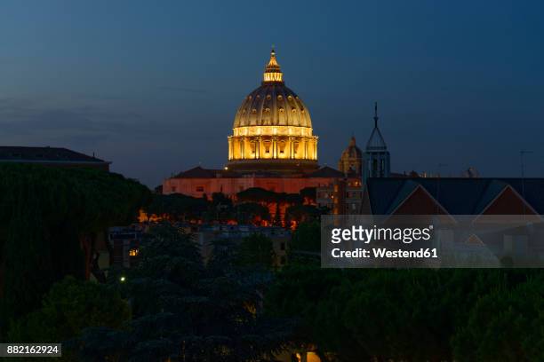 italy, rome, illuminated st. peter's basilica at night - saint peter's basilica stock pictures, royalty-free photos & images