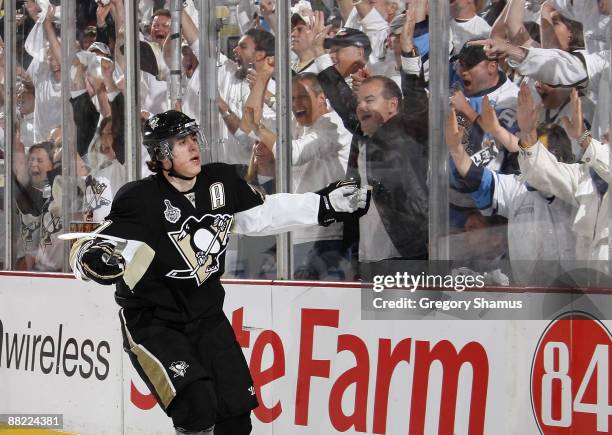 Evgeni Malkin of the Pittsburgh Penguins celebrates after scoring the first goal against the Detroit Red Wings during Game Four of the 2009 NHL...