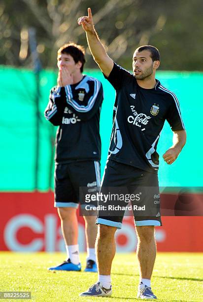 Argentina's Lionel Messi and Javier Mascherano during a training session at the Asociacion Argentina de Futbol facilities on June 4, 2009 in Buenos...