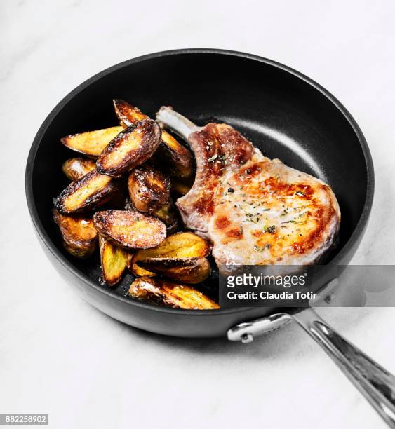 roasted pork chops with potatoes - fingerling potato stock pictures, royalty-free photos & images