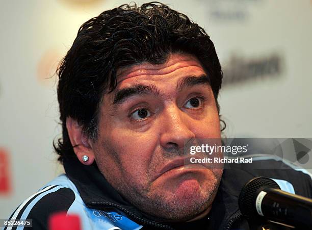 Argentina head coach Diego Maradona attends a press conference after a training session at the Asociacion Argentina de Futbol facilities on June 4,...