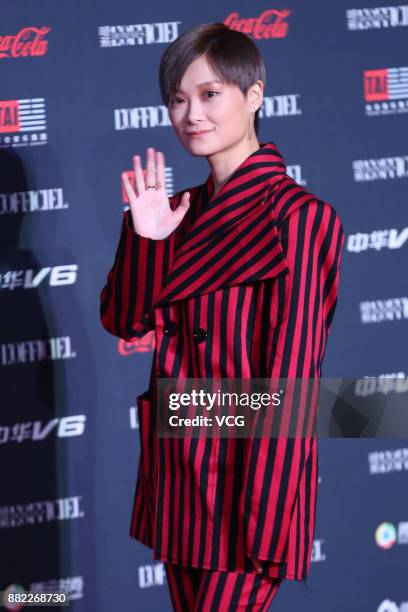 Singer Chris Lee arrives at the red carpet of L'Officiel Fashion Night 2017 on November 29, 2017 in Beijing, China.