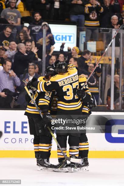 The Boston Bruins celebrate a goal in the second period against the Tampa Bay Lightning at the TD Garden on November 29, 2017 in Boston,...