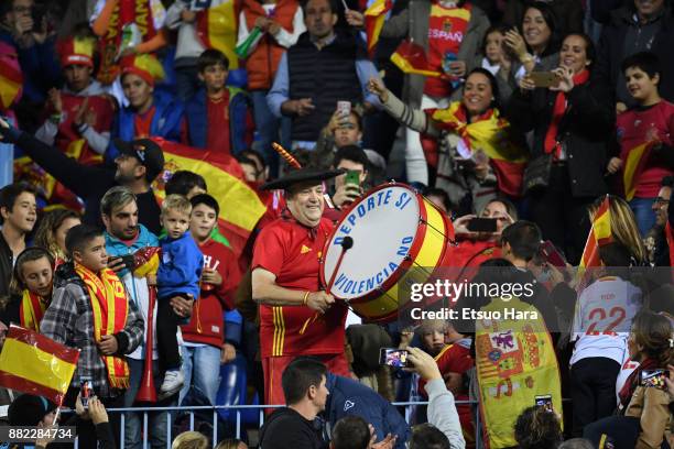 Manuel Caceres Manolo el del bombo cheers with fans during the international friendly match between Spain and Costa Rica at La Rosaleda Stadium on...