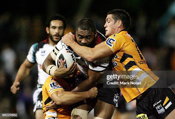 Petero Civoniceva of the Panthers is tackled during the round 13 NRL match between the Wests Tigers and the Penrith Panthers at Leichhardt Oval on...