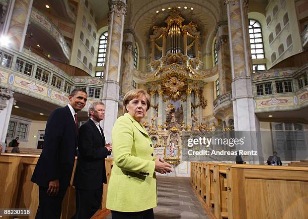 President Barack Obama, bishop Jochen Bohl and German Chancellor Angela Merkel tour Dresden's landmark, the Frauenkirche on June 5, 2009 in Dresden,...