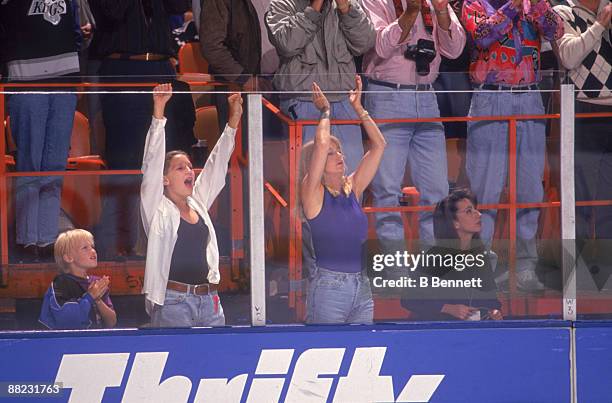 American actress Goldie Hawn and her children Wyatt Russell and future actress Kate Hudson applaud during game four of the Stanley Cup Finals between...