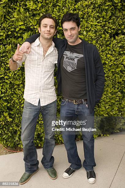 Actors Jonathan Sadowski and Reid Scott attend GBK's Pre MTV Pool Party- Day 1 on May 29, 2009 in Los Angeles, California.