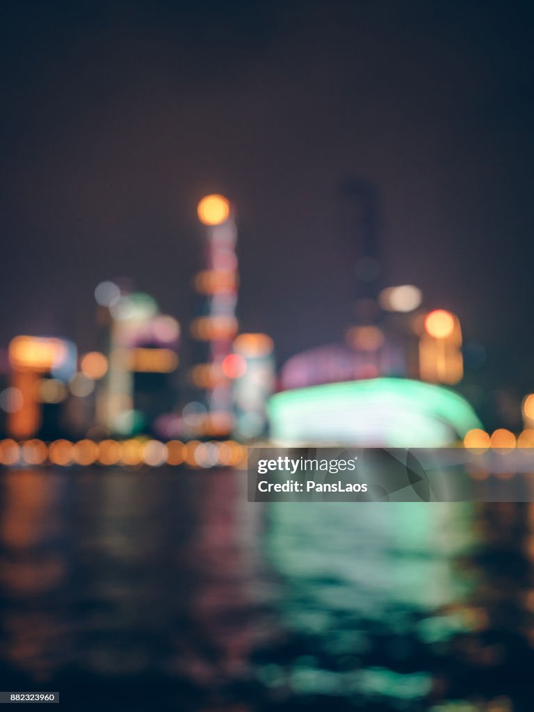 Blur lights of modern building at night in Guangzhou city