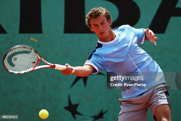 Henri Laaksonen of Finland hits a forehand during the Boy's Singles Semi Final match against Daniel Berta of Sweden on day thirteen of the French...