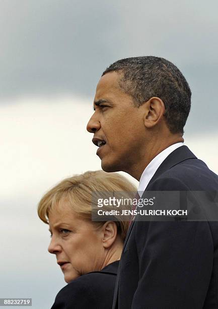 President Barack Obama and Chancellor Angela Merkel visit the former Nazi concentration camp at Buchenwald near in the eastern German city of Weimar...