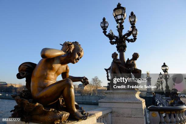 The Pont Alexandre III is an arch bridge that spans the Seine, connecting the Champs-Élysées quarter and the Invalides and Eiffel Tower quarter. It...