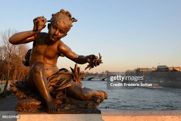 The Pont Alexandre III is an arch bridge that spans the Seine, connecting the Champs-Élysées quarter and the Invalides and Eiffel Tower quarter. It...